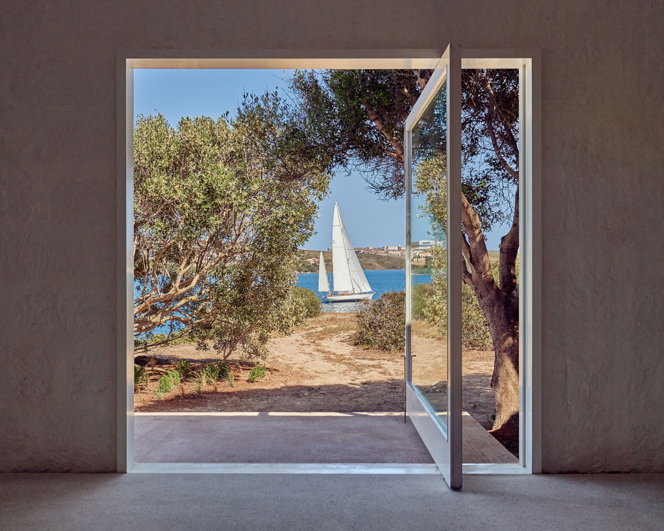 View of boat from gallery: Hauser & Wirth Menorca, Courtesy Hauser & Wirth, Photo © Daniel Schäfer